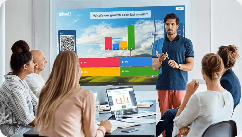 Male presenting to his colleagues using Kahoot!