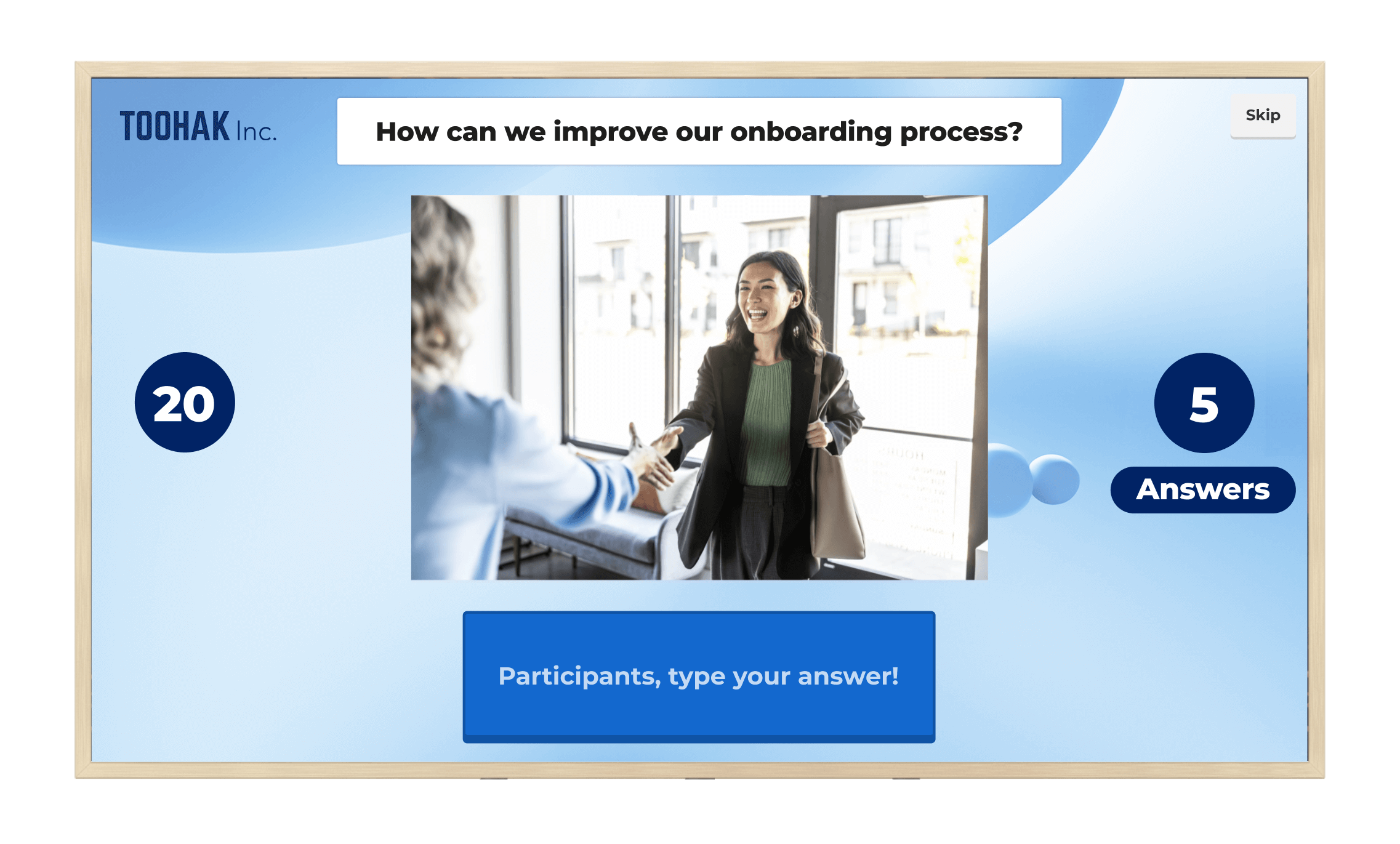 A monitor displaying a live Kahoot! open-ended question for 