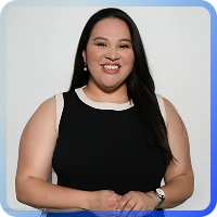 A headshot of a smiling. The photo is set against a plain beige background and framed by a thin, blue-to-gray gradient border.